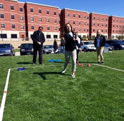 Millikin sophomore women's basketball athlete Maxine Krol takes her turn at bocce